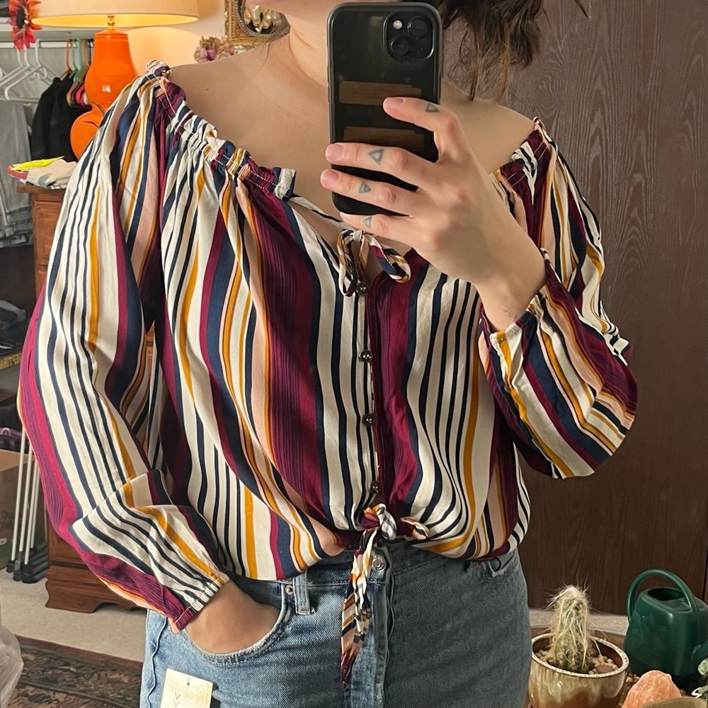 Light weight button front long sleeve crop top.